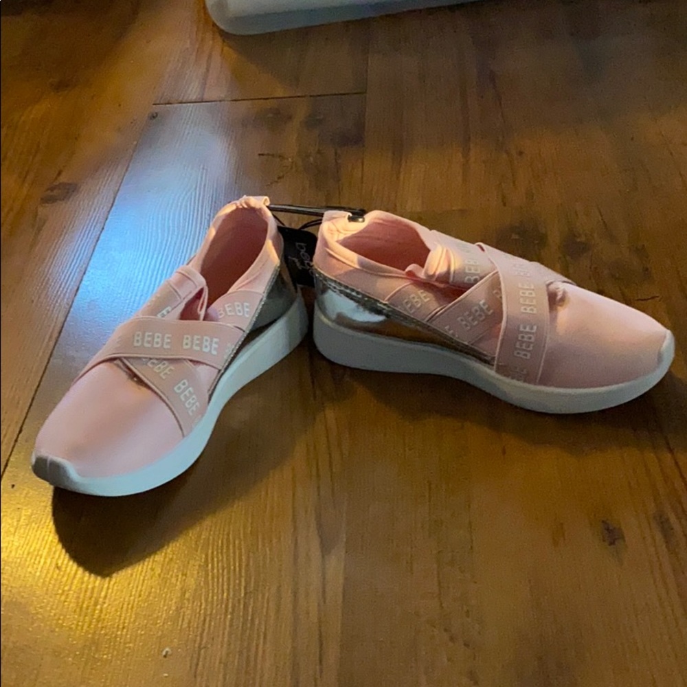 Girls Bebe pink sneakers.